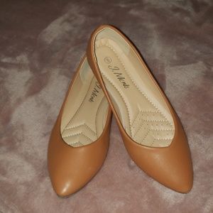 Tan pointed toe flats